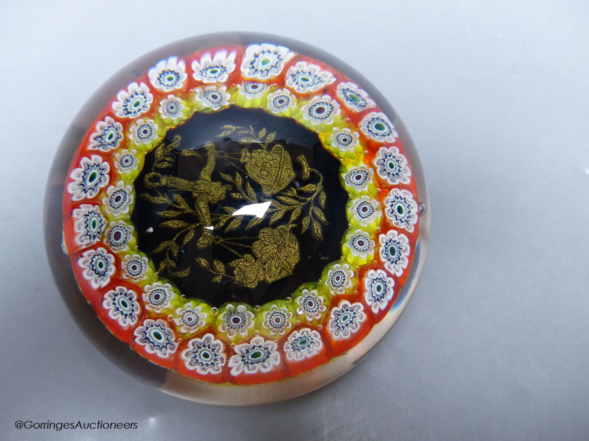 A 20th century Italian glass millefiore paperweight